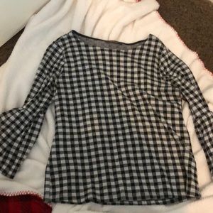 Long sleeved ruffled blouse